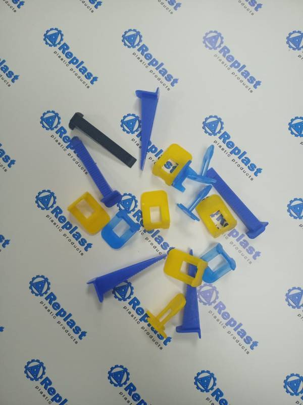 Система вирівнювання плитки